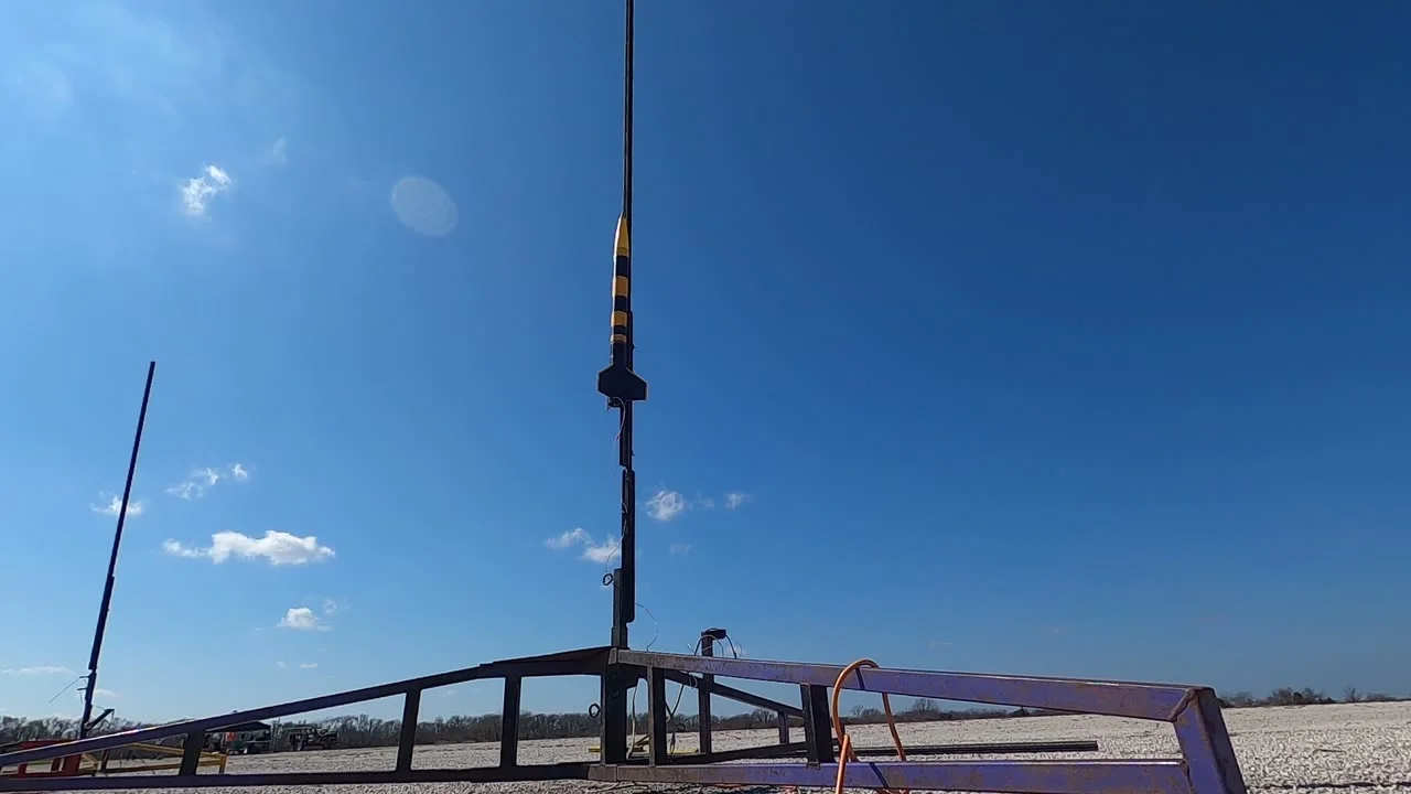 Hornet standing vertically on its launch fixture before flight